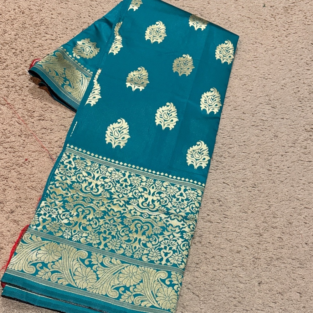 Elegant Teal and Gold Patterned Banarasi silk saree